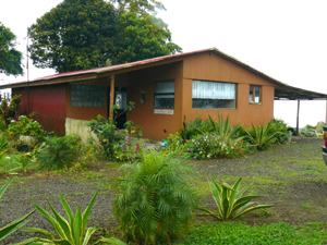 The house has a small patio in back and a very large lakeview veranda in front.